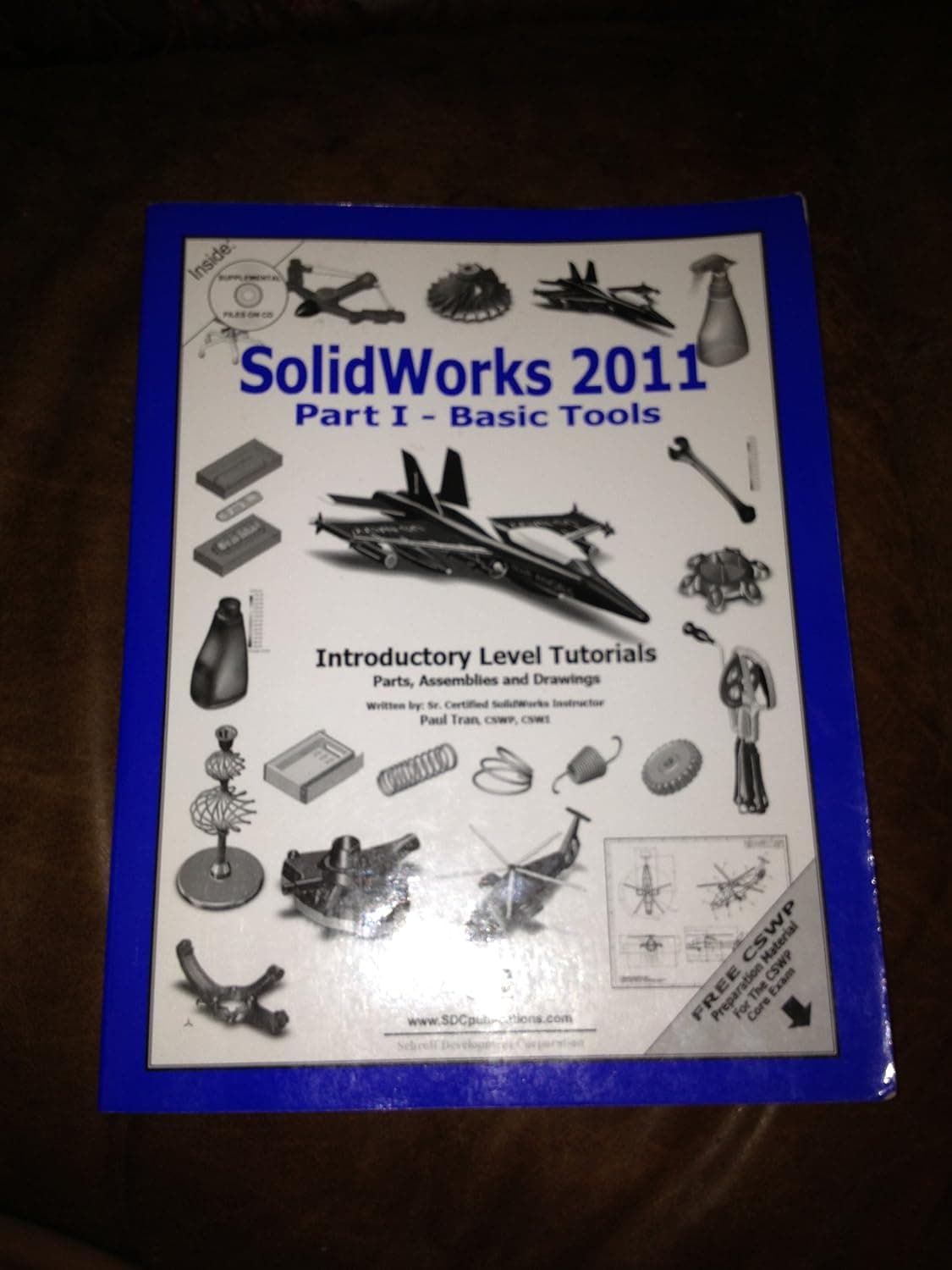 Solidworks 2011: Basic Tools: Introductory Level Tutorials Parts, Assemblies and Drawings - Paul Tran